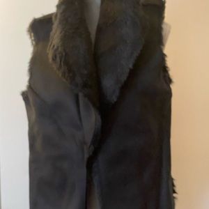 Black faux suede fur vest.